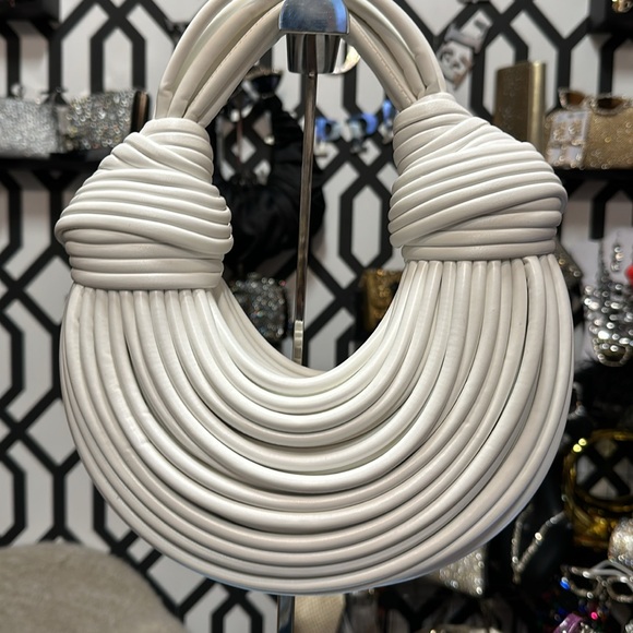 A rope purse holds very few items example phone lipstick keys handheld purse - Picture 8 of 10